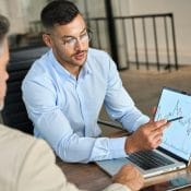 Financial advisor explaining invest stock market data consulting investor.